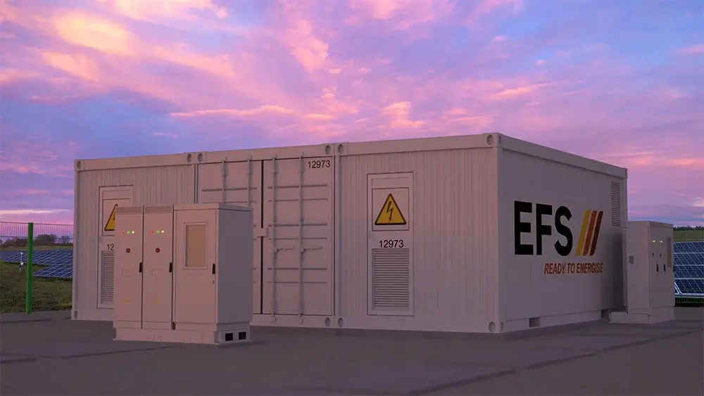 large scale solar facility with EFS Group logo and pink sunset background